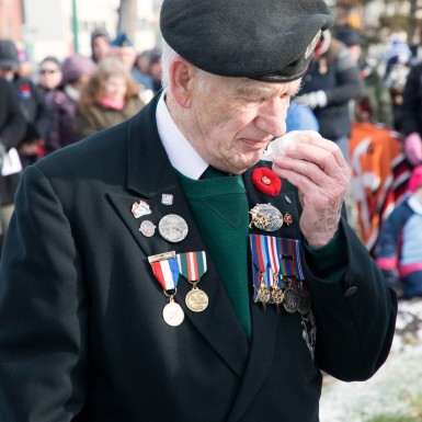 A Second World War Veteran and member of The Royal Winnipeg Rifles gets emotional during the service.